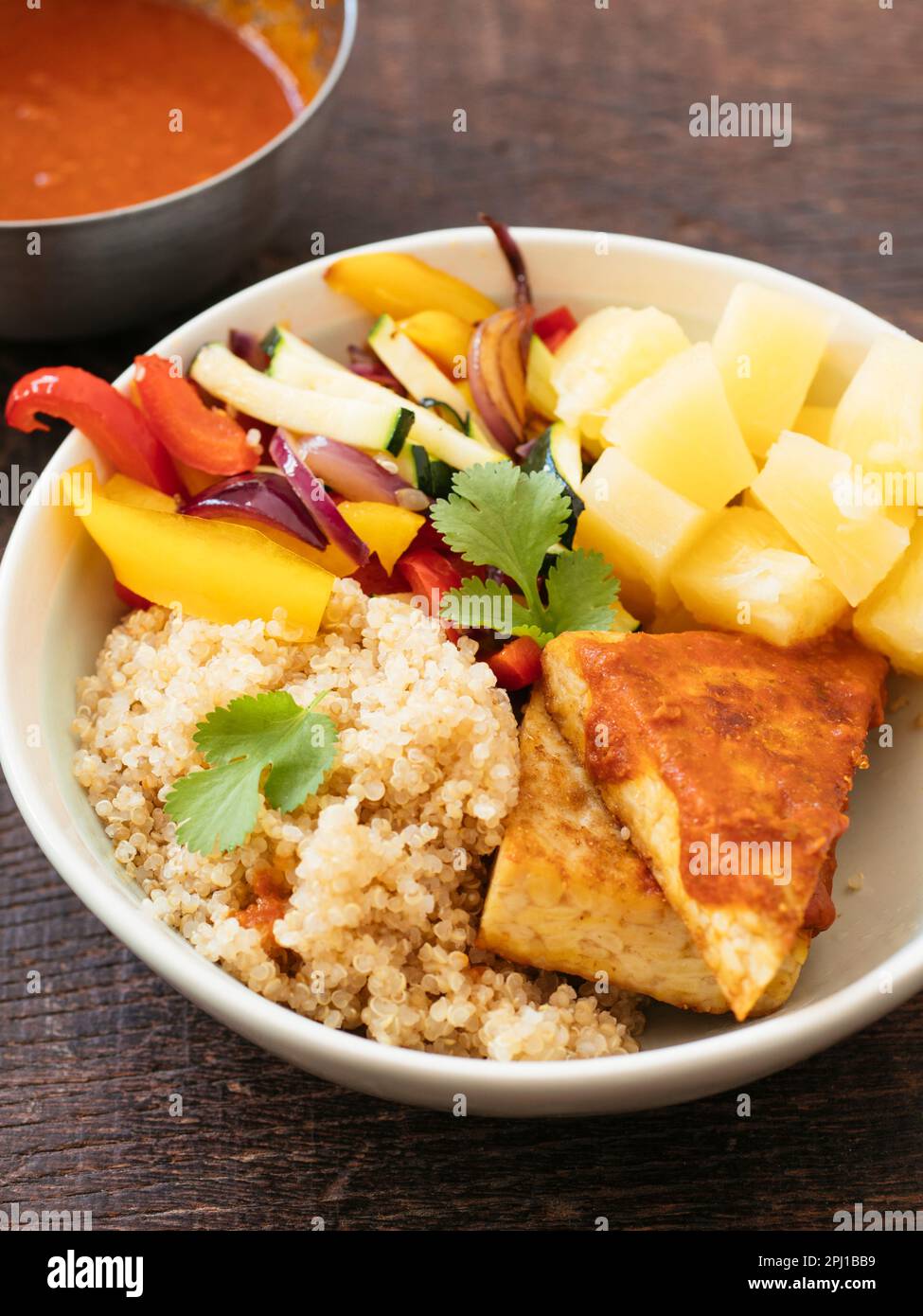 Hawaiian Barbecued Tempeh Bowl with quinoa, tempeh, bell peppers