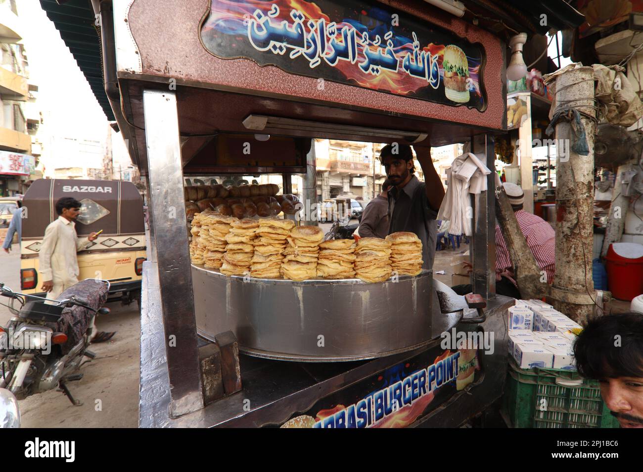 Burns Road march 2021, A young man making Bun Kebab at famous and old