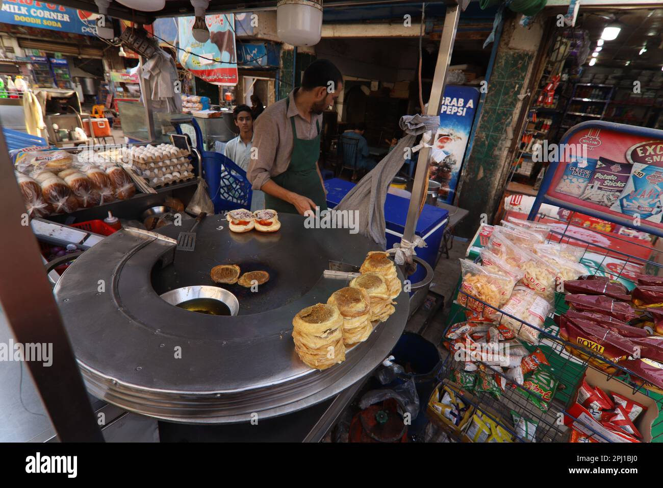Burns Road march 2021, A young man making Bun Kebab at famous and old