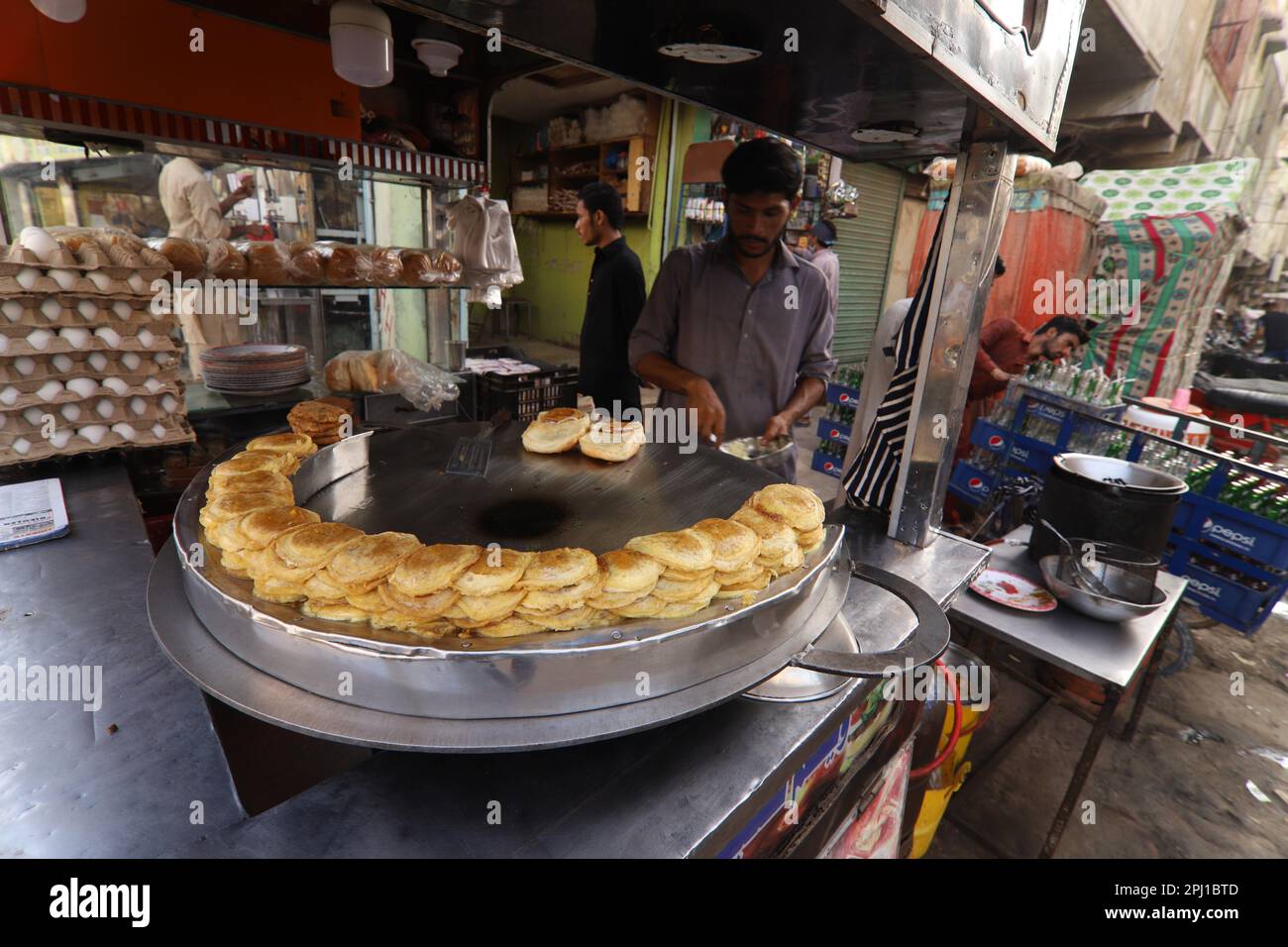 Burns Road march 2021, A young man making Bun Kebab at famous and old