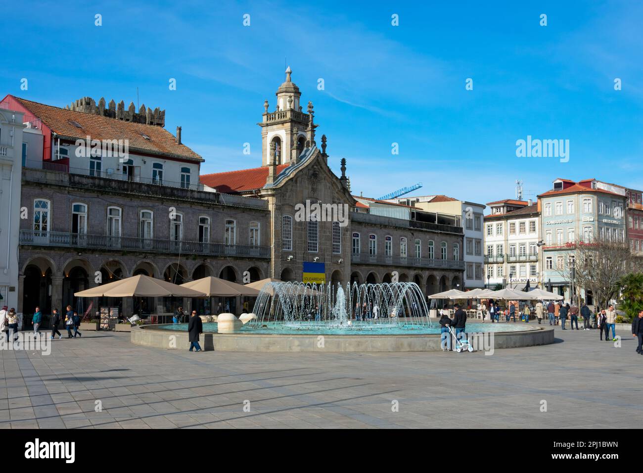 Braga, Portugal. February 12, 2023. Republic Square, a fountain and Lapa church Stock Photo