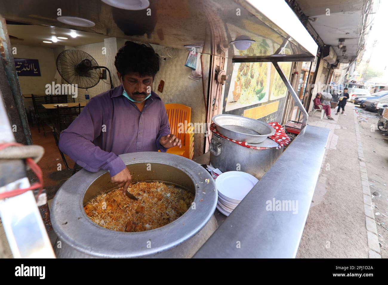Burns Road march 2021, A young man selling biryani at famous and old