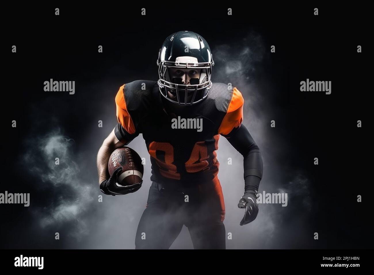 American football player on a dark background in smoke in black and orange equipment Stock Photo