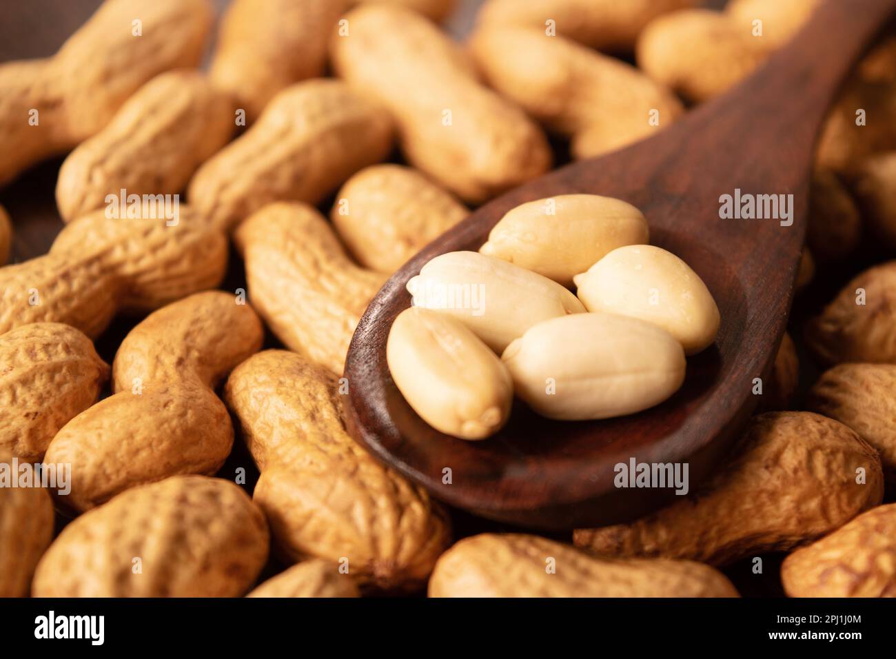 Roasted peanut without shell in spoon Stock Photo Alamy