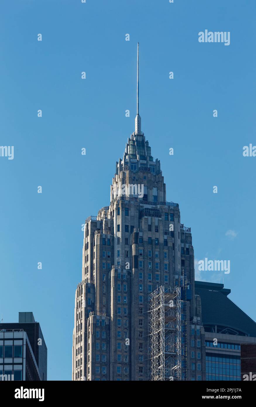 70 Pine Street’s needle-like Art Deco spire. The building’s lighting was to symbolize energy producer role of builder, oil company Cities Service. Stock Photo