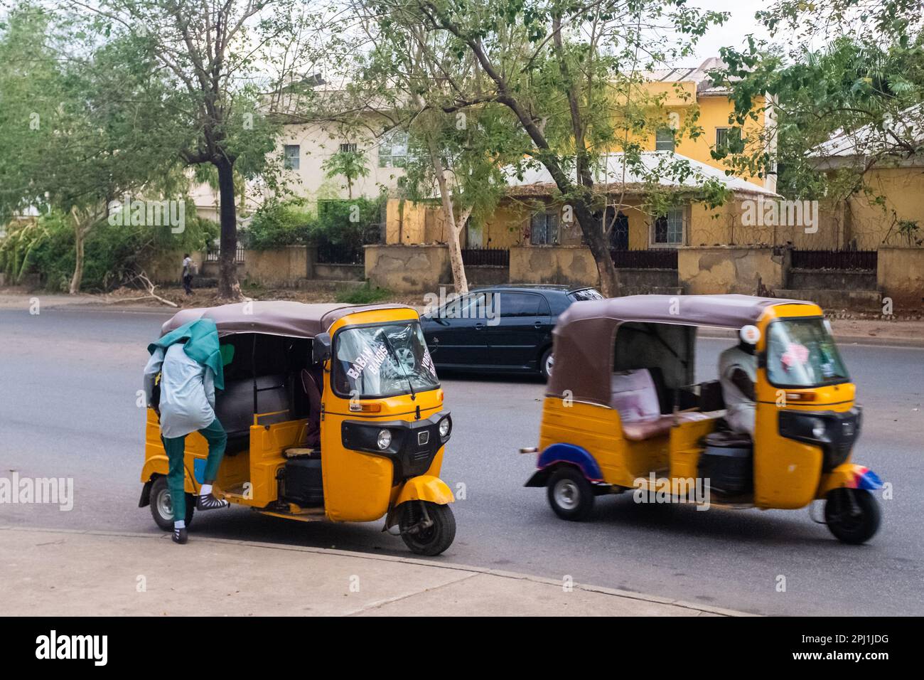A school girl enters a tricycle in the National Legislative quarters in