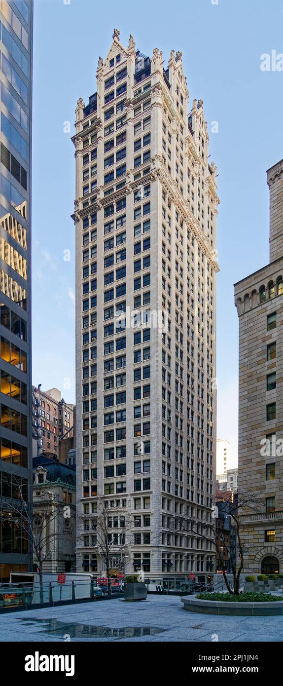 55 Liberty Street, Liberty Tower, is sheathed in white terra cotta on three sides. The former Sinclair Oil Building has been converted to apartments. Stock Photo