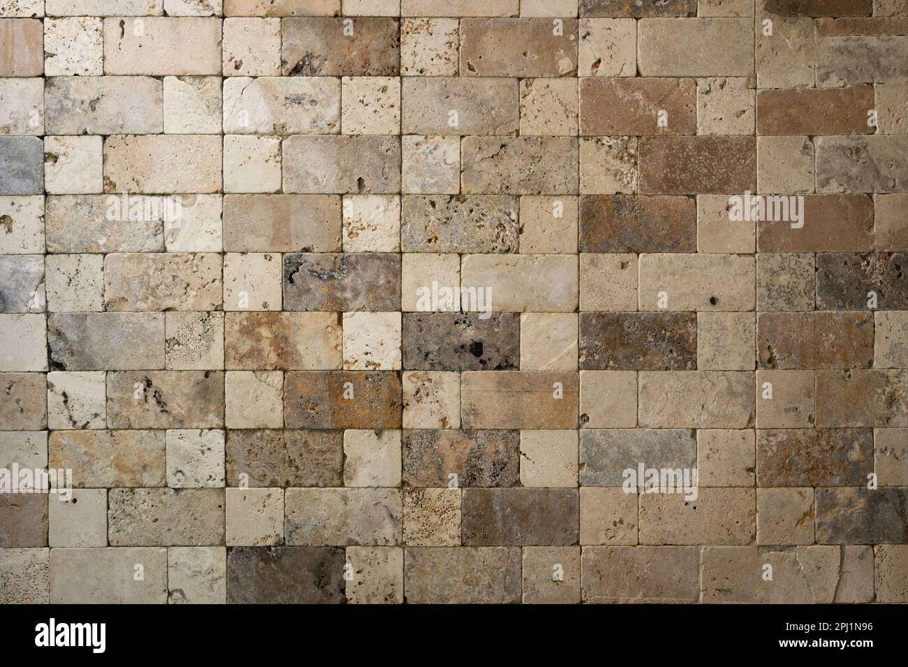 Brown square shape bricks texture pattern close up view Stock Photo