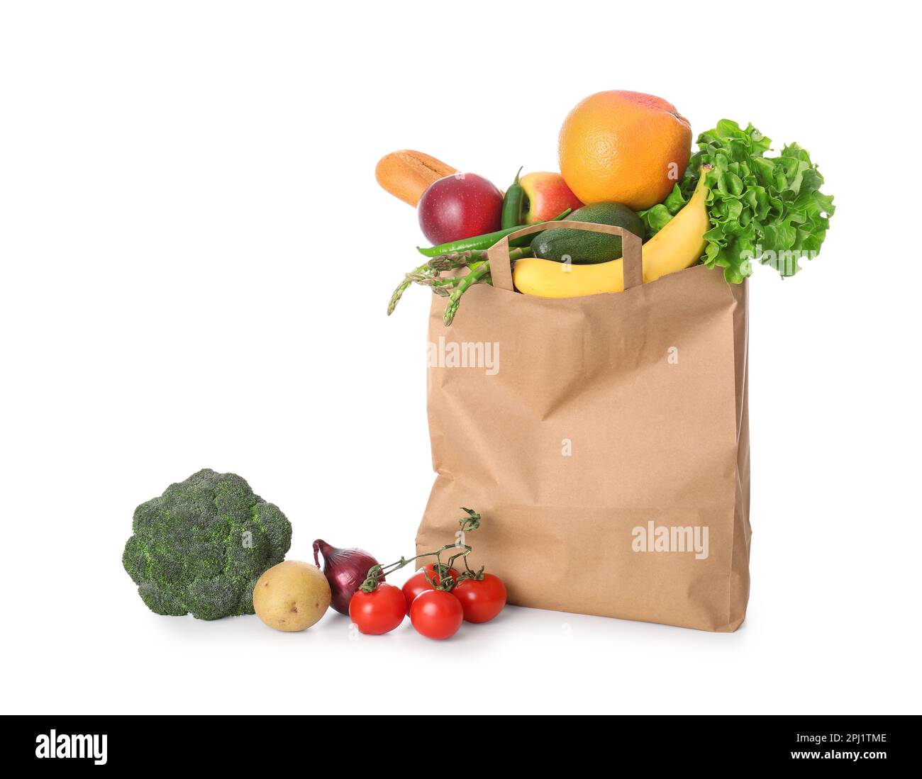 Paper bag with vegetables and fruits on white background Stock Photo ...