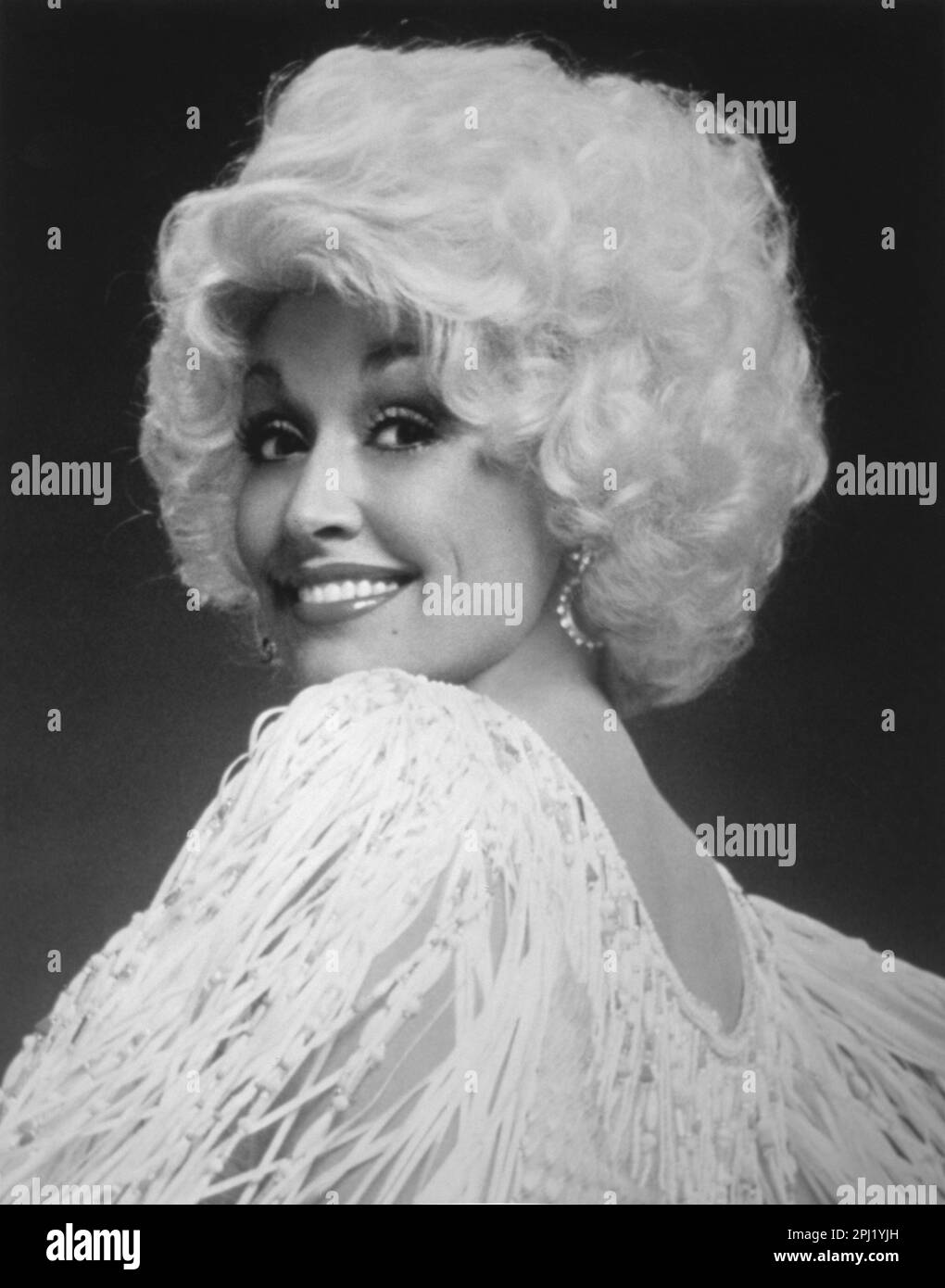 PR shot of American singer/songwriter, Dolly Parton Stock Photo