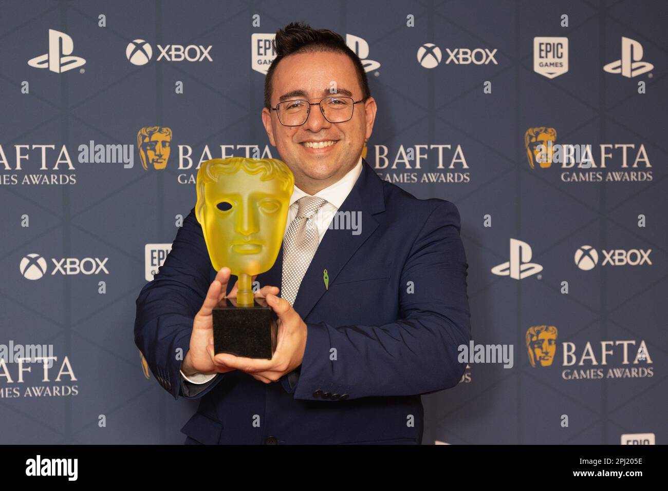 Bruno Velazquez, from Santa Monica Studio/Sony Interactive Entertainment with the EE Game of The Year Award for God of War Ragnarok at the BAFTA Games Awards at the Queen Elizabeth Hall, Southbank Centre, London. Picture date: Thursday March 30, 2023. Stock Photo