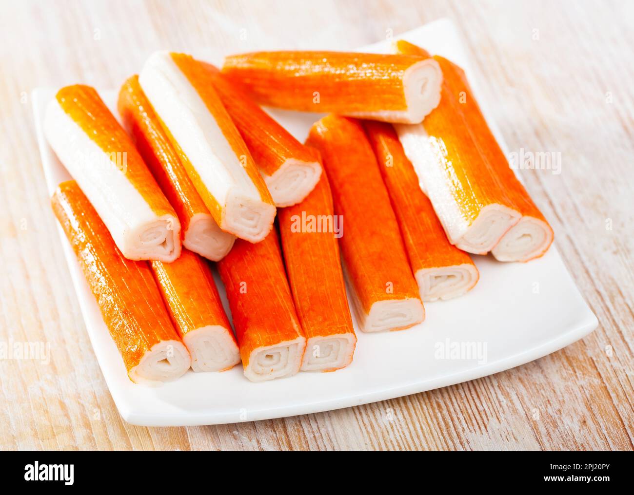Py Sticks Crab sticks group on white plate Stock Photo - Alamy