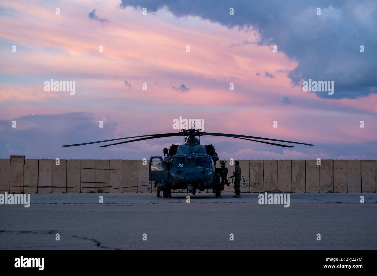 A U.S. Air Force HH-60 Pave Hawk assigned to the 46th Expeditionary Rescue Squadron prepares to take off for a night operation during a mission rehearsal in support of Exercise Agile Spartan within the U.S. Central Command area of responsibility, March 21, 2023. Exercise Agile Spartan is a combined, joint training exercise that enhances international partnerships and regional security in the USCENTCOM AOR. (U.S. Air Force photo by Senior Airman Jackson Manske) Stock Photo