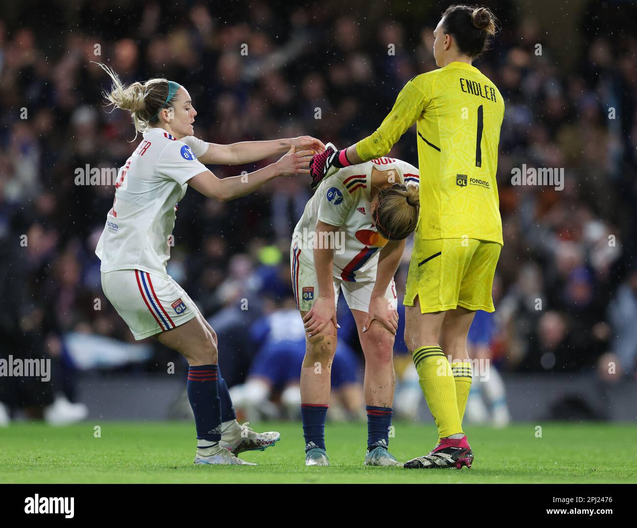 London, UK. 30th Mar, 2023. Lindsey Horan of Olympique Lyon is consoled by team mates after missing a penalty during the penalty shoot out during the UEFA Womens Champions League match at Stamford Bridge, London. Picture credit should read: Paul Terry/Sportimage Credit: Sportimage/Alamy Live News Stock Photo