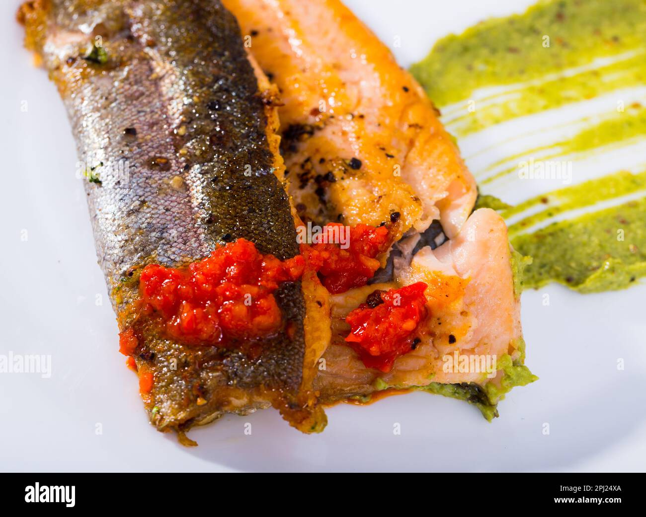 Fried trout fillets with sauces Stock Photo Alamy