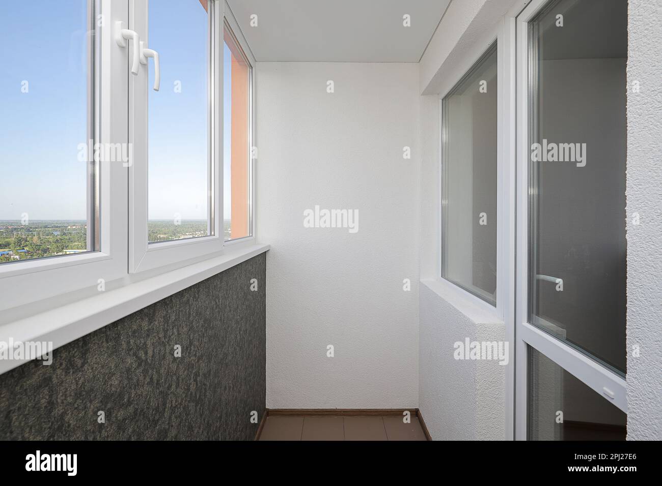 White plastic windows inside the apartment building Stock Photo