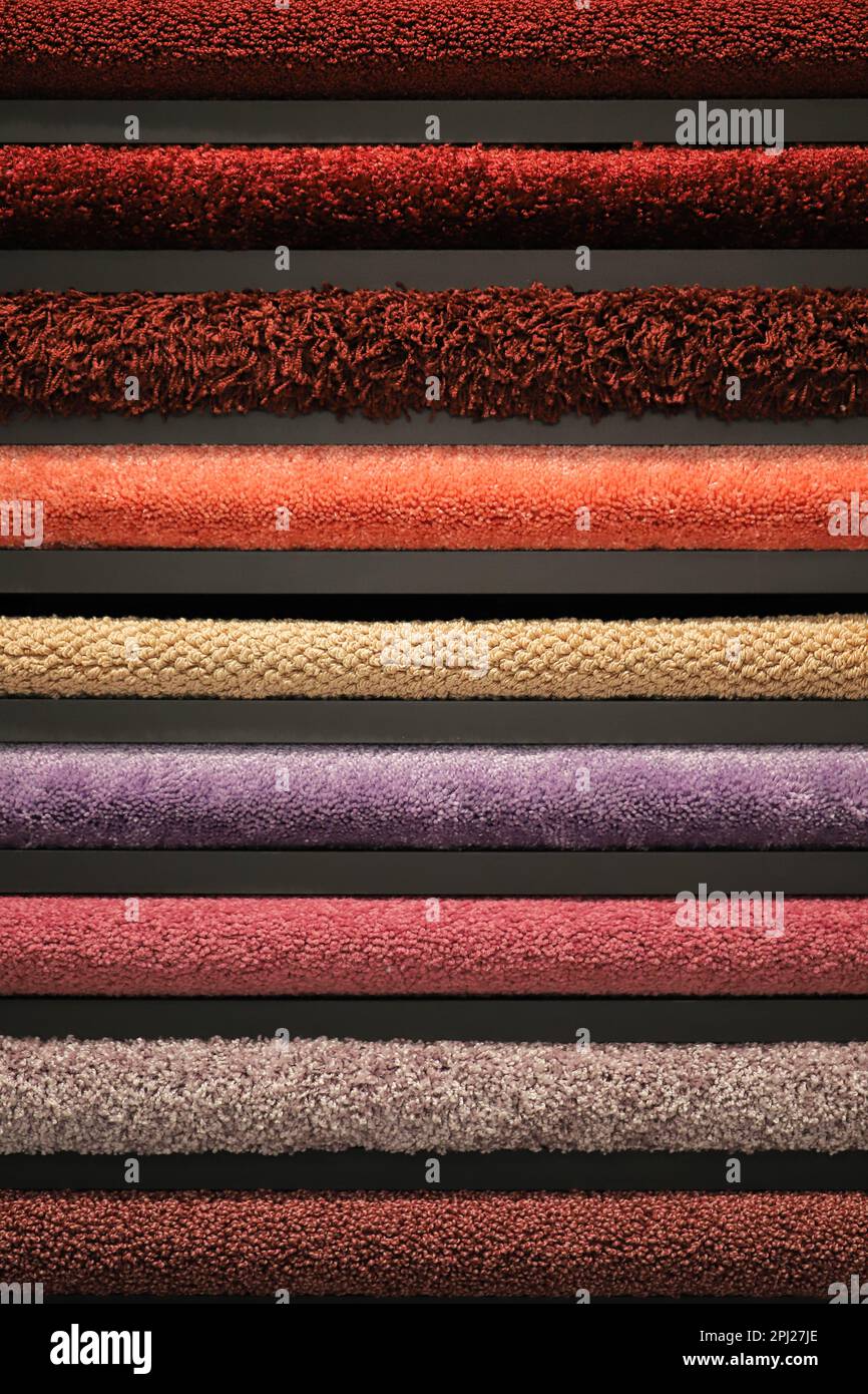 Assortment of textures of various colored fabrics close-up Stock Photo ...