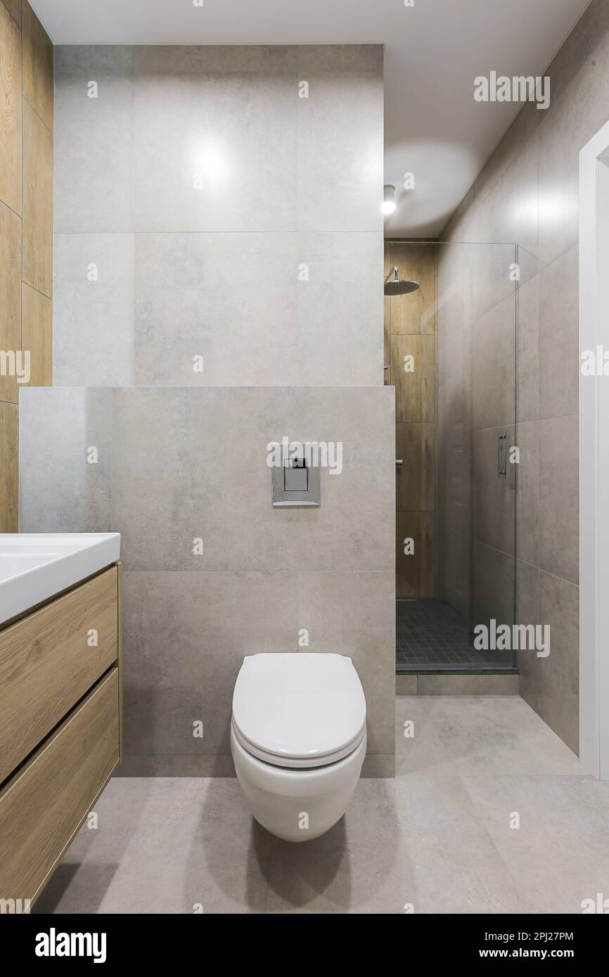 White toilet bowl in a modern bathroom interior Stock Photo - Alamy