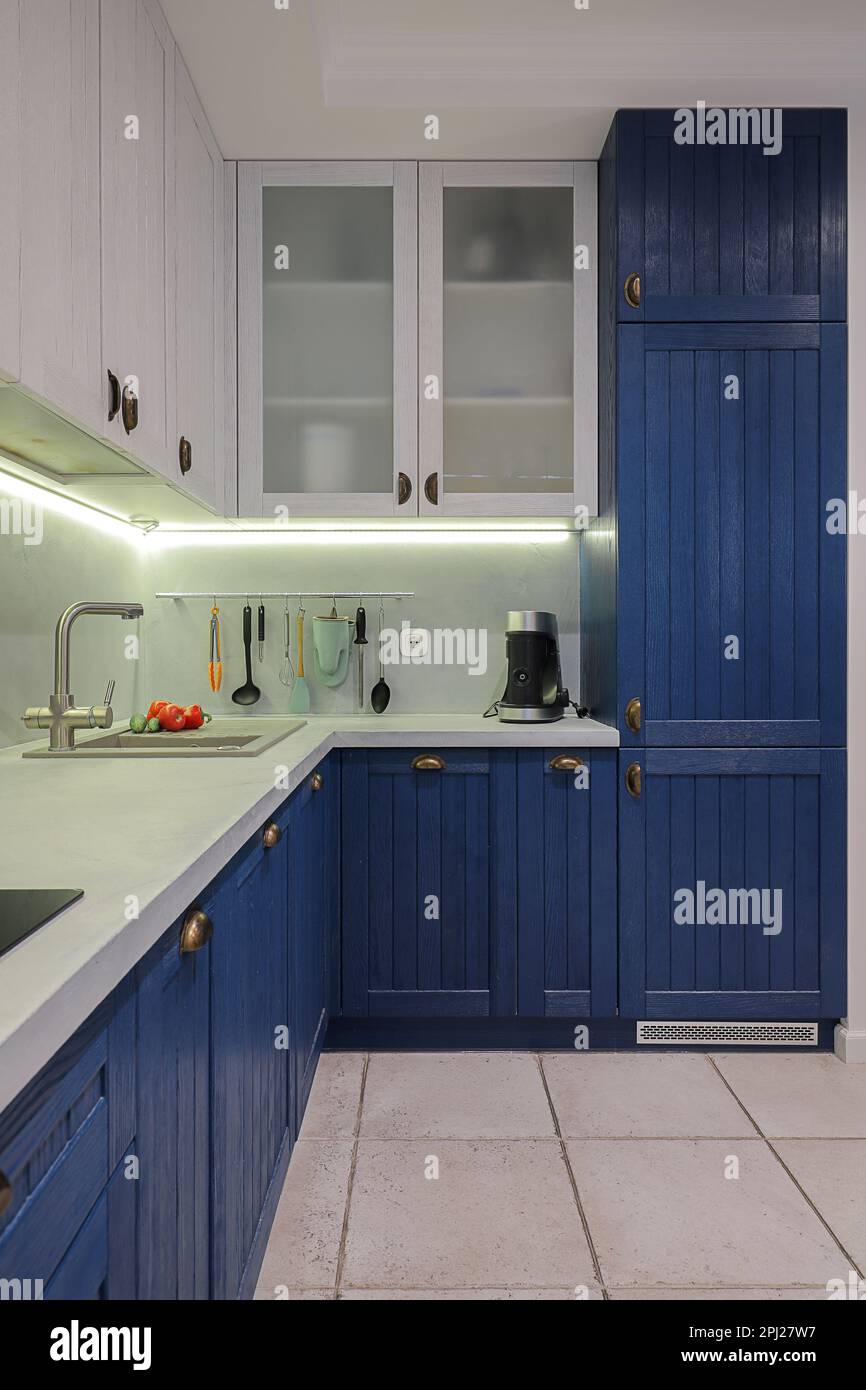 Kitchen furniture in the kitchen interior at home Stock Photo