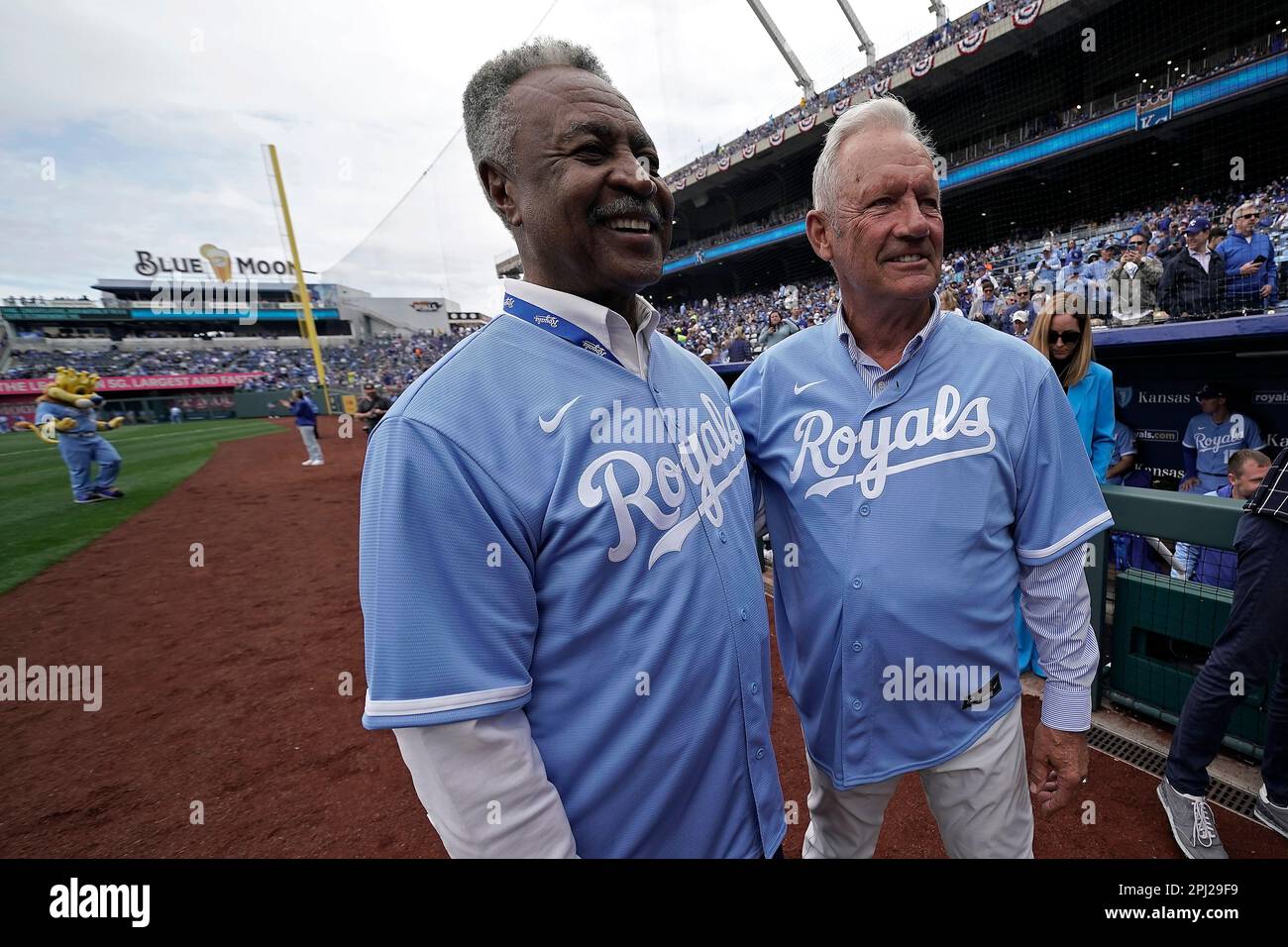 Kansas City Royals hall-0f-famers Frank White, left, and George