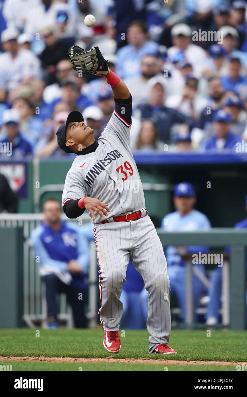 Kansas City, United States. 30th Mar, 2023. Minnesota Twins second baseman Donovan  Solano (39) catches a Kansas City Royals pop fly during the seventh inning  on Opening Day at Kauffman Stadium in