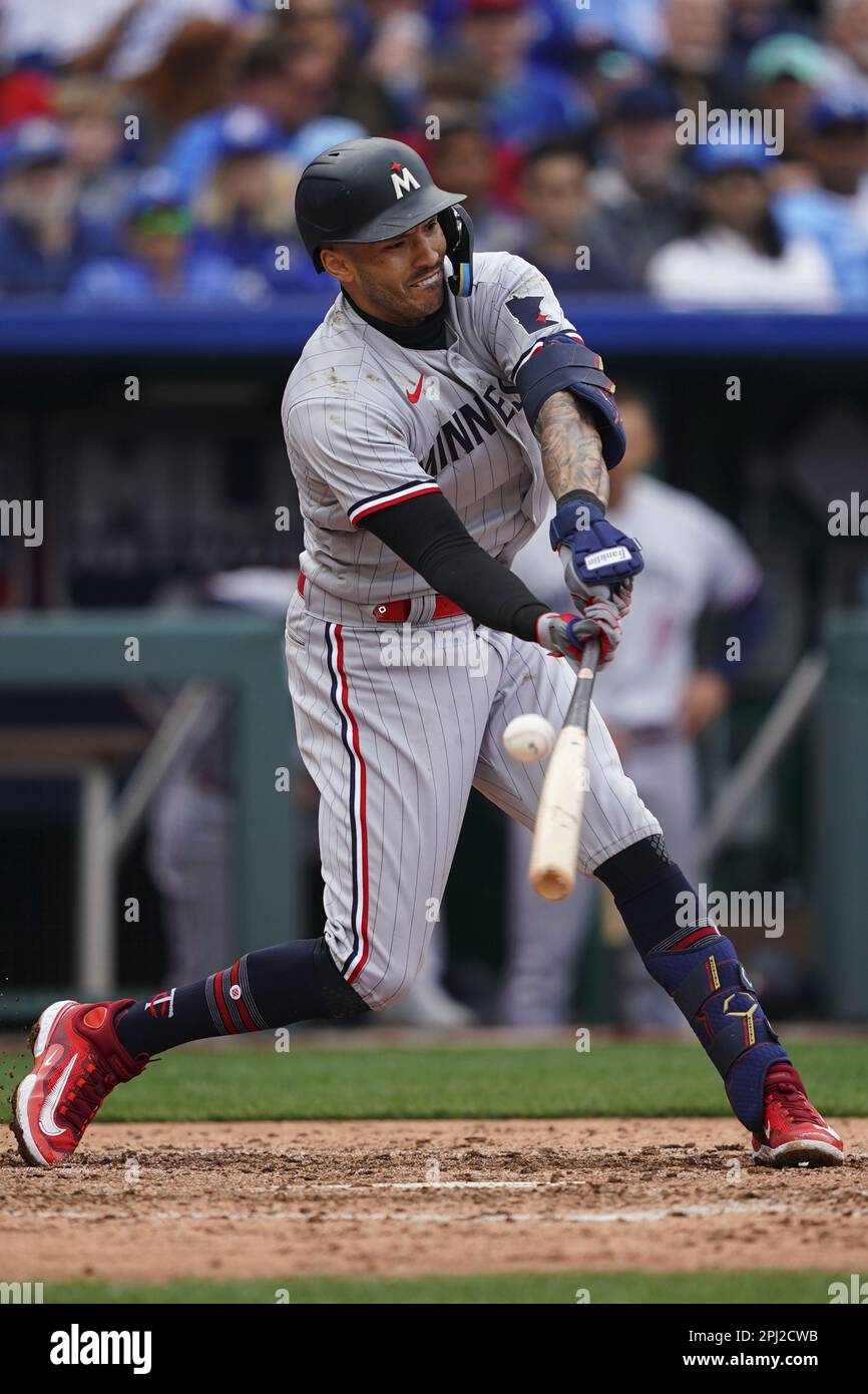 Kansas City, United States. 30th Mar, 2023. Minnesota Twins shortstop Carlos Correa (4) connects on a Kansas City Royals pitch during the fourth inning on Opening Day at Kauffman Stadium in Kansas City, Missouri on Thursday, March 30, 2023. Photo by Kyle Rivas/UPI Credit: UPI/Alamy Live News Stock Photo