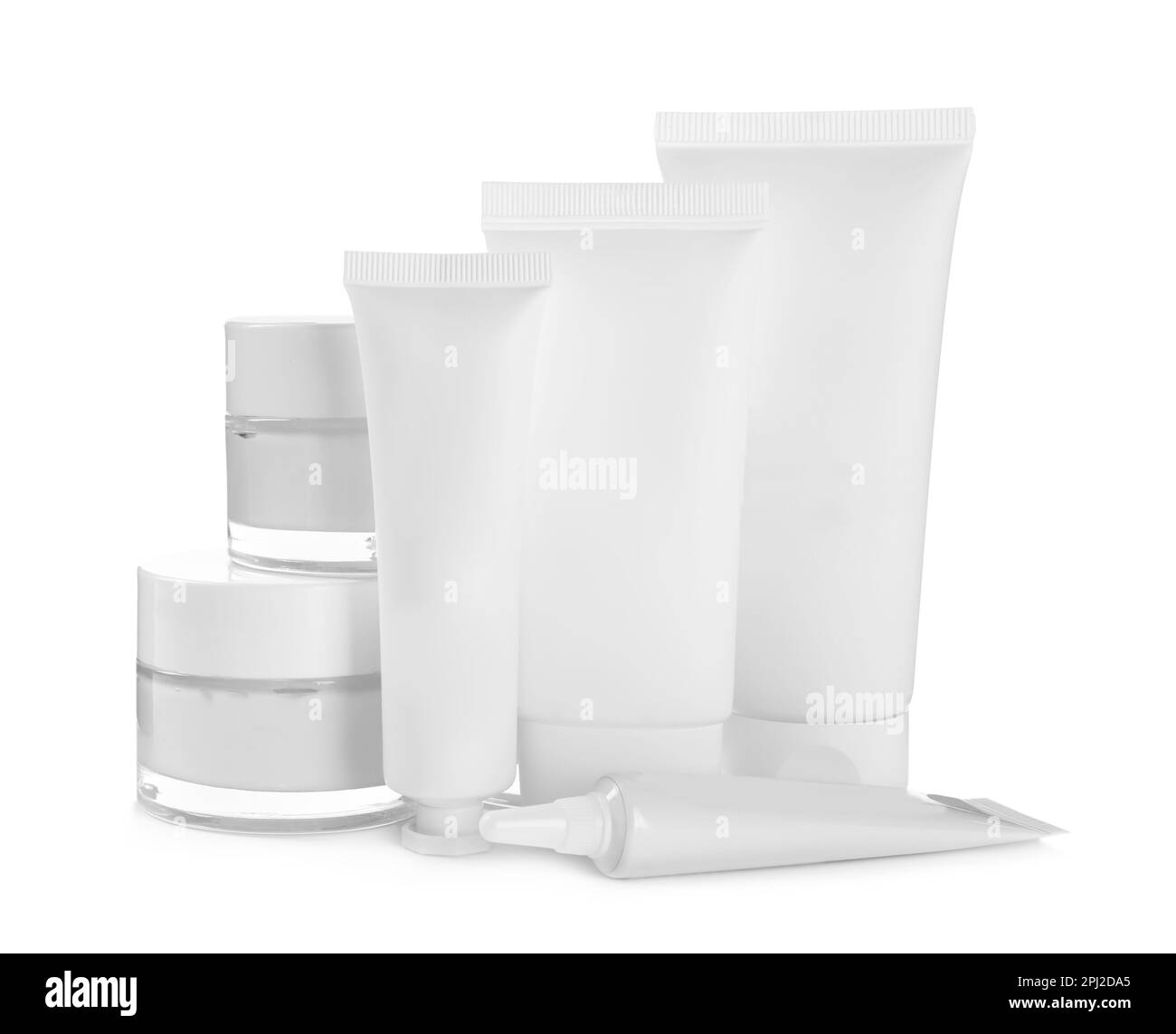 Blank tubes and jars of cosmetic products on white background Stock ...
