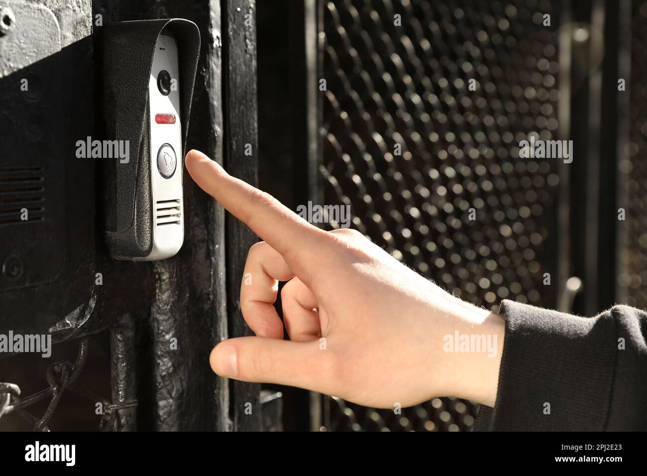 Ring doorbell hand closeup hi-res stock photography and images - Alamy
