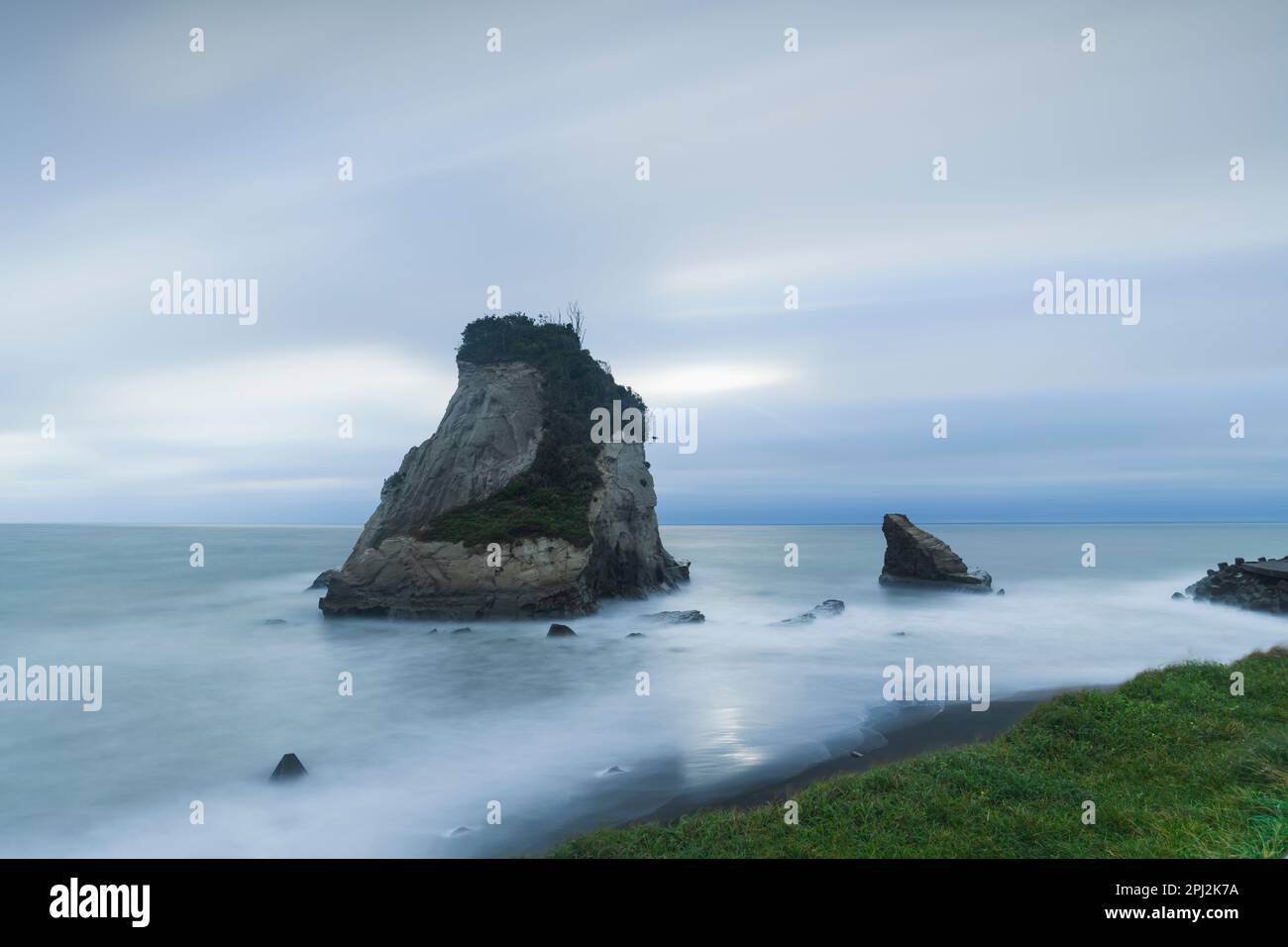 Long exposure shot of sea stacks in the water, Chiba Prefecture, Japan Stock Photo