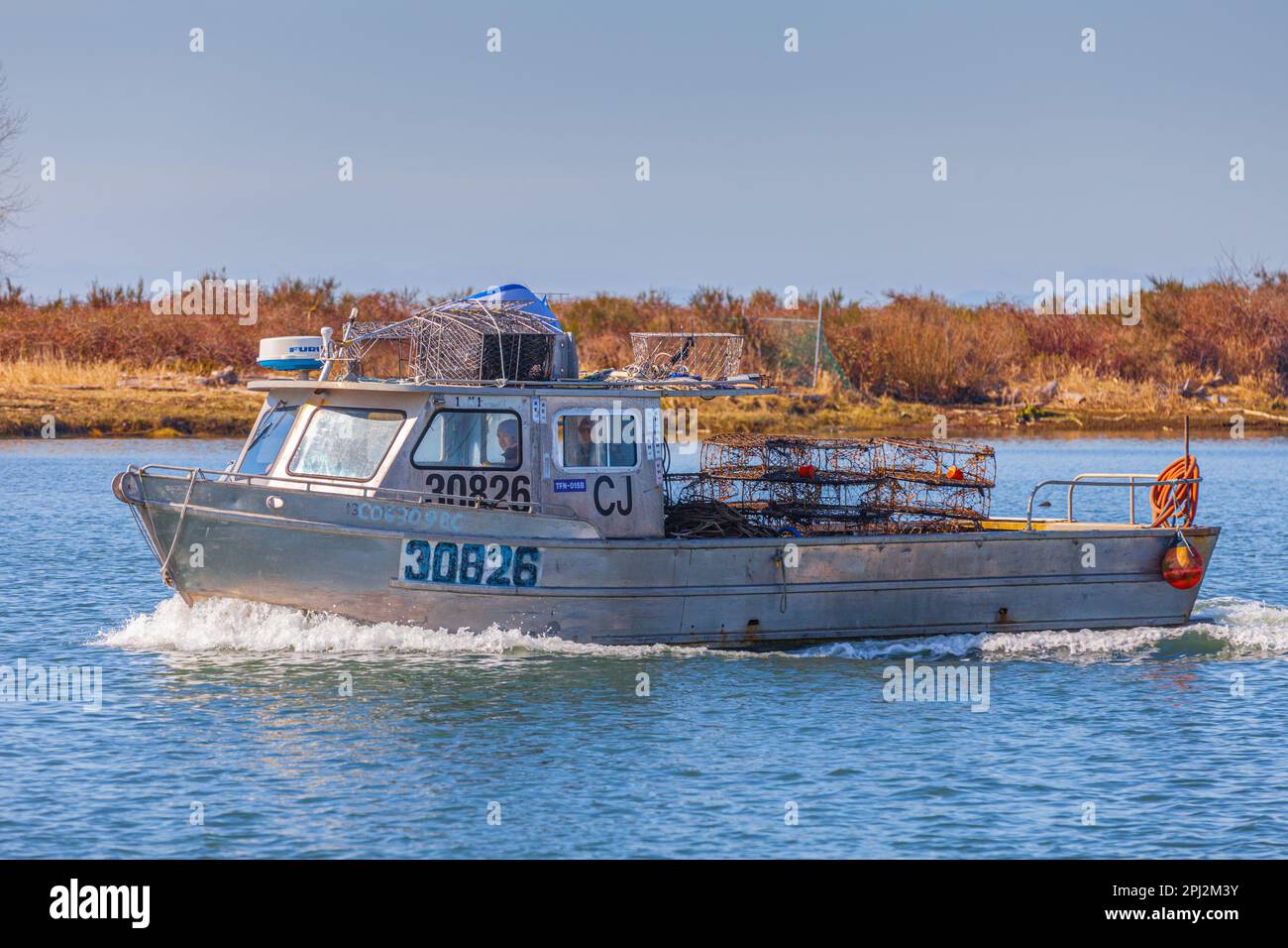 Crab boat returning to harbour in Steveston British Columbia Canada