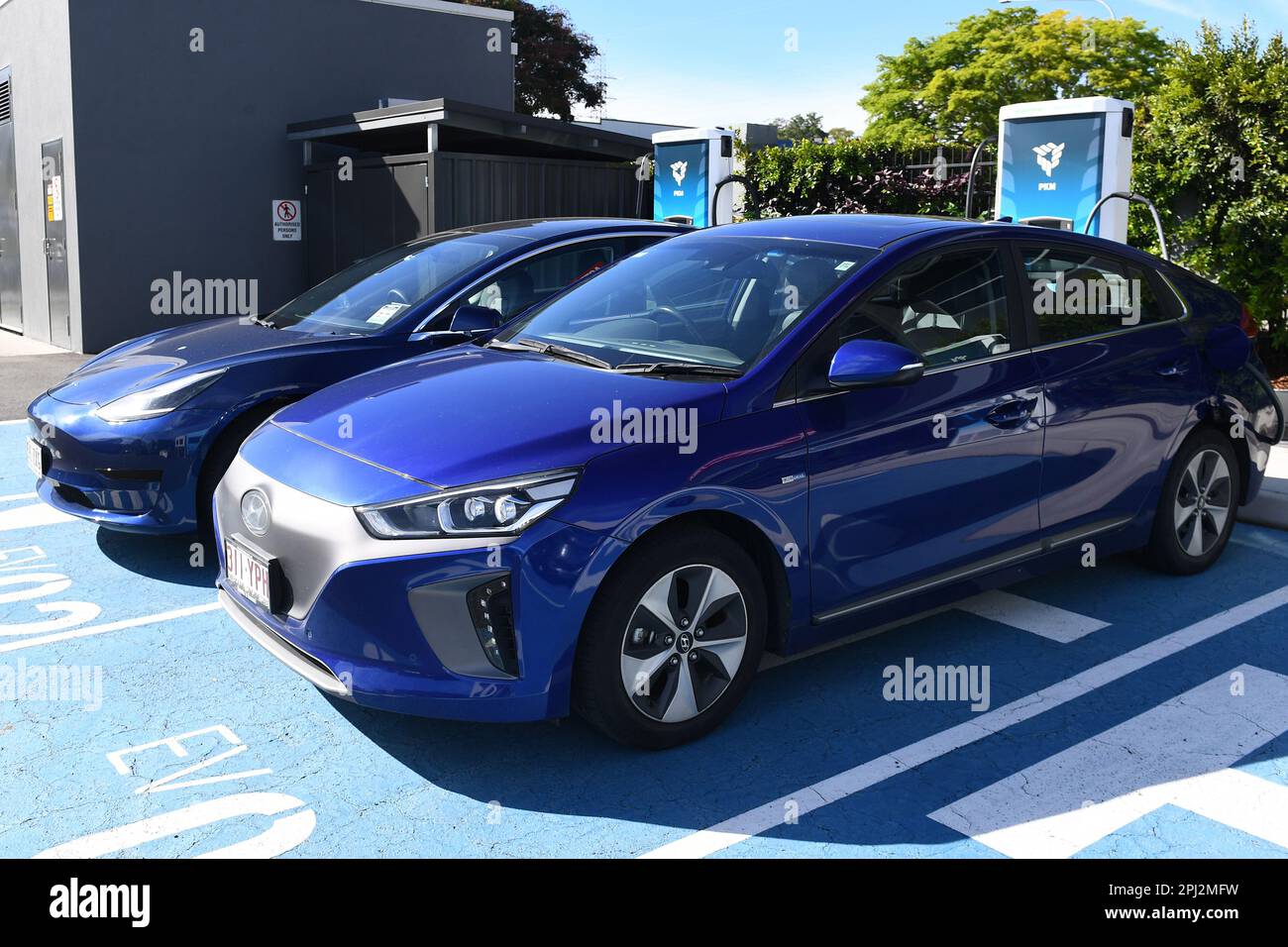 Electric cars and charging stations are seen atTritium, Brisbane