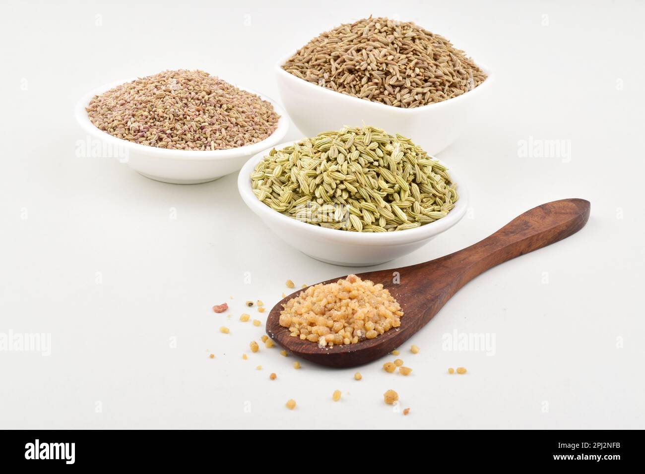 All indian spice on white background, fennel seeds and asafoetida with