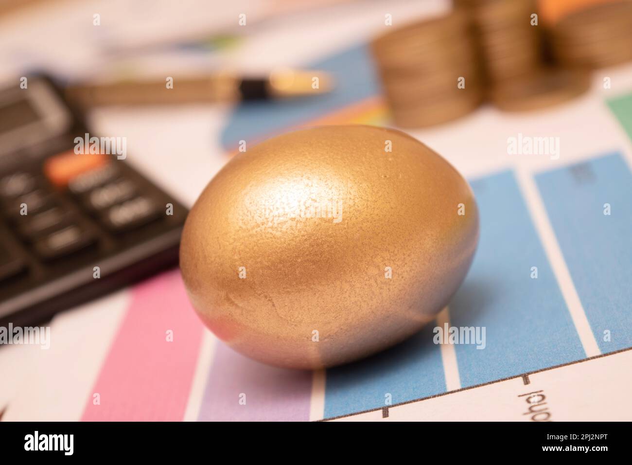 Golden egg at tablet, long term investment concept Stock Photo Alamy