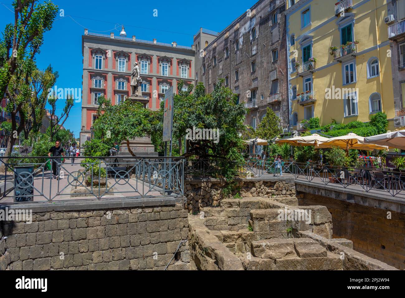 Naples, Italy, May 19, 2022: Ruins of the greek wall in the historical center of Naples, Italy. Stock Photo