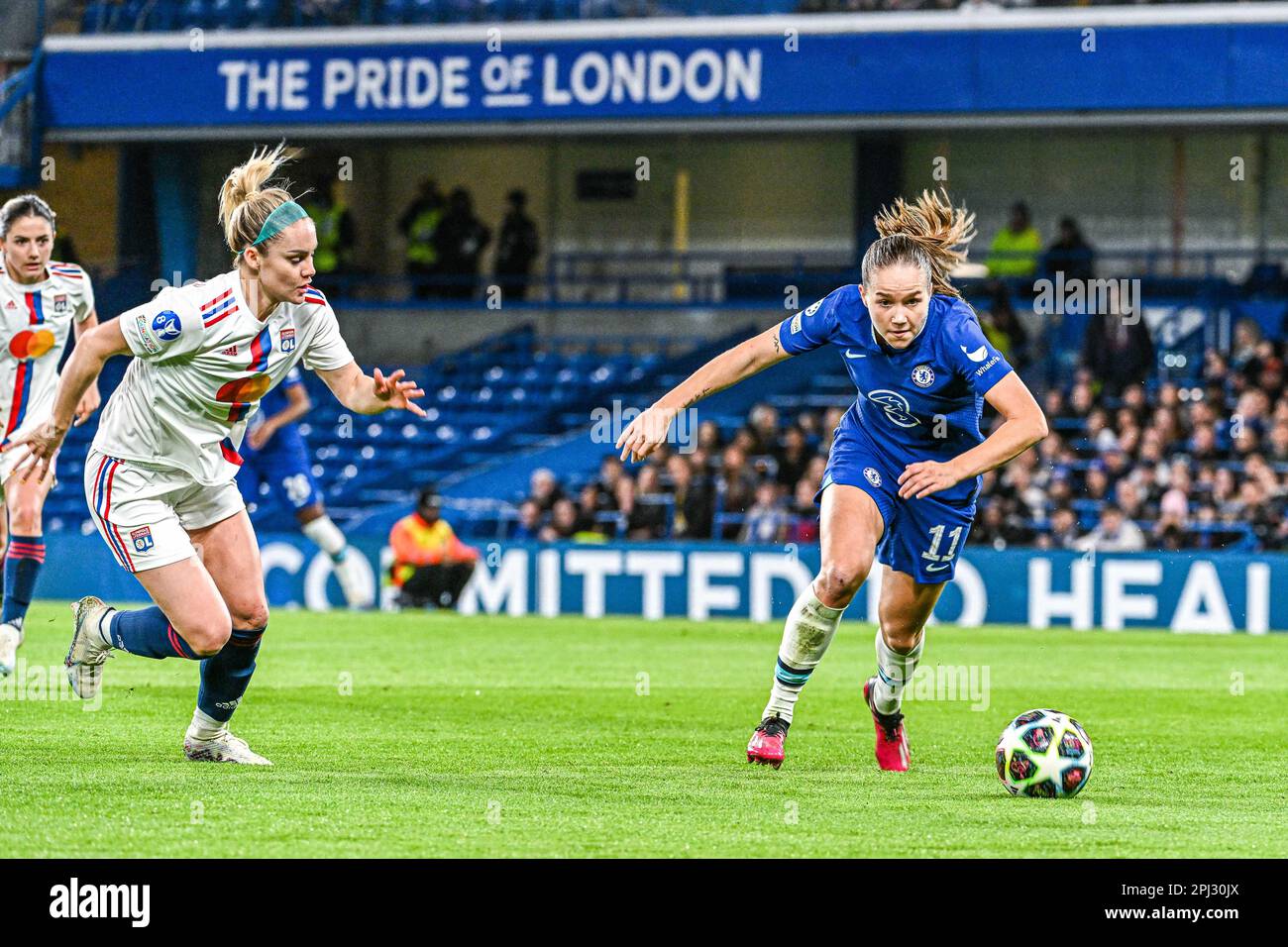 Ellie Carpenter (12) of Lyon and Guro Reiten (11) of Chelsea pictured