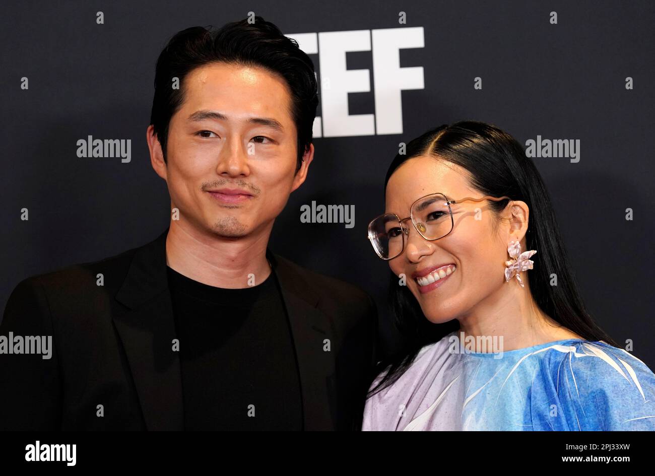 Steven Yeun, left, and Ali Wong, cast members in "Beef," pose together