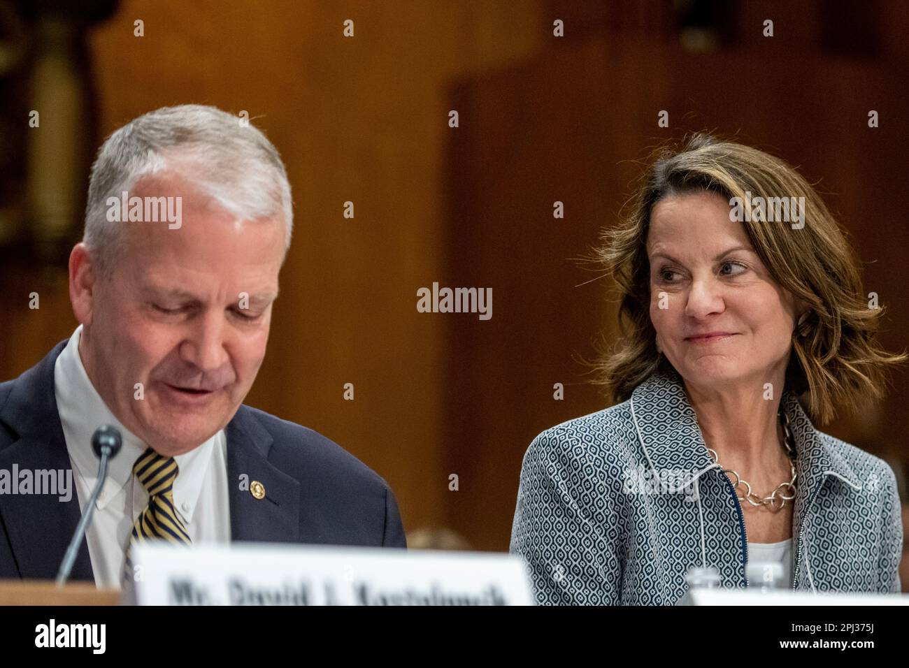 United States Senator Dan Sullivan (Republican of Alaska), left, offers remarks in support of Robin Dunnigan, right, as she appears before a Senate Committee on Foreign Relations hearing for her nomination to be Ambassador to Georgia, in the Dirksen Senate Office Building in Washington, DC, Thursday, March 30, 2023. Credit: Rod Lamkey/CNP /MediaPunch Stock Photo