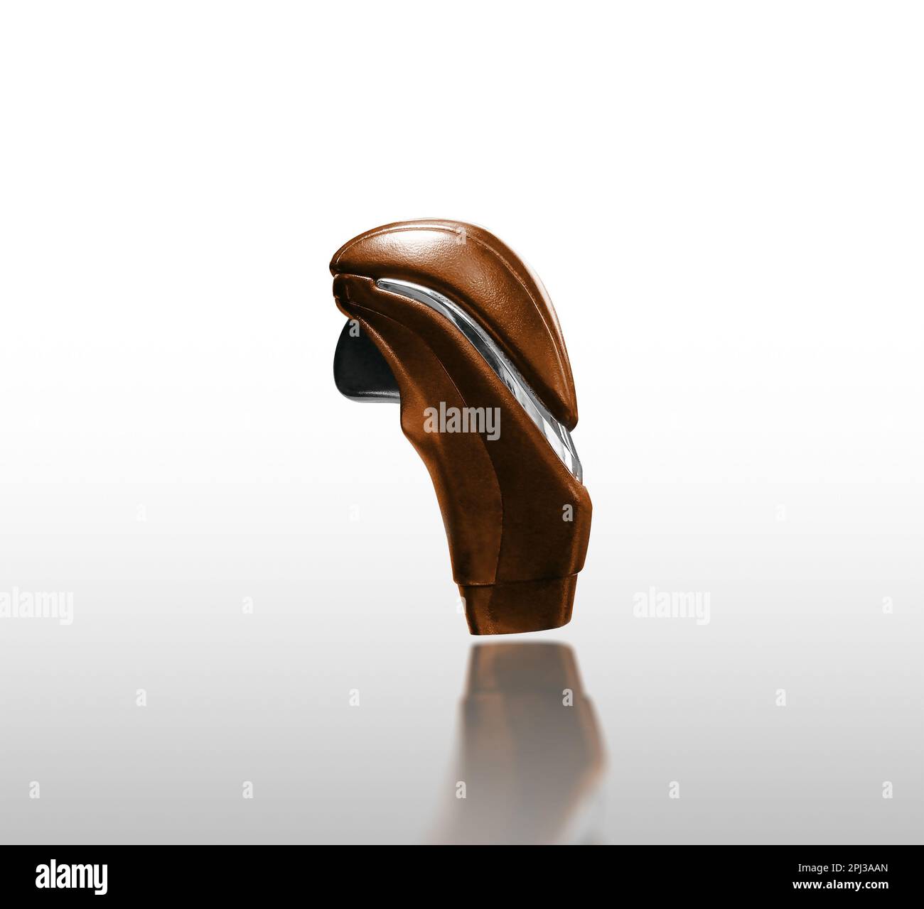 Brown leather car gear knob isolated with chrome stripe and push button release on white background with reflection, Clipping path included. Stock Photo