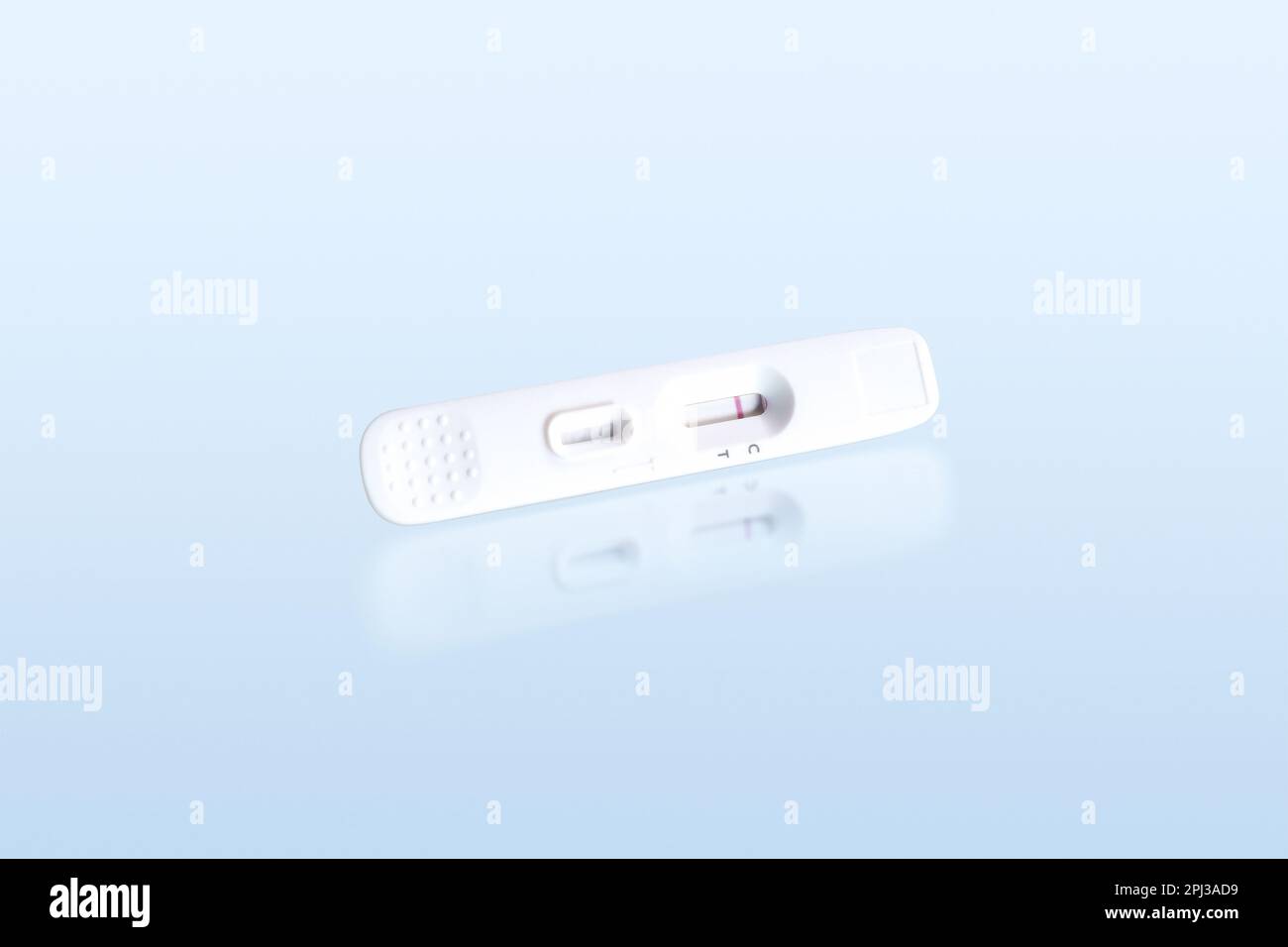 Negative antigen test of antigen test cassette isolated on blue