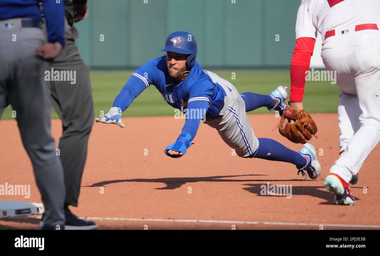 Toronto Blue Jays George Springer dives for third base in the first inning against the St. Louis Cardinals at Busch Stadium in St. Louis on Thursday, March 30, 2023. Photo by Bill Greenblatt/UPI Stock Photo