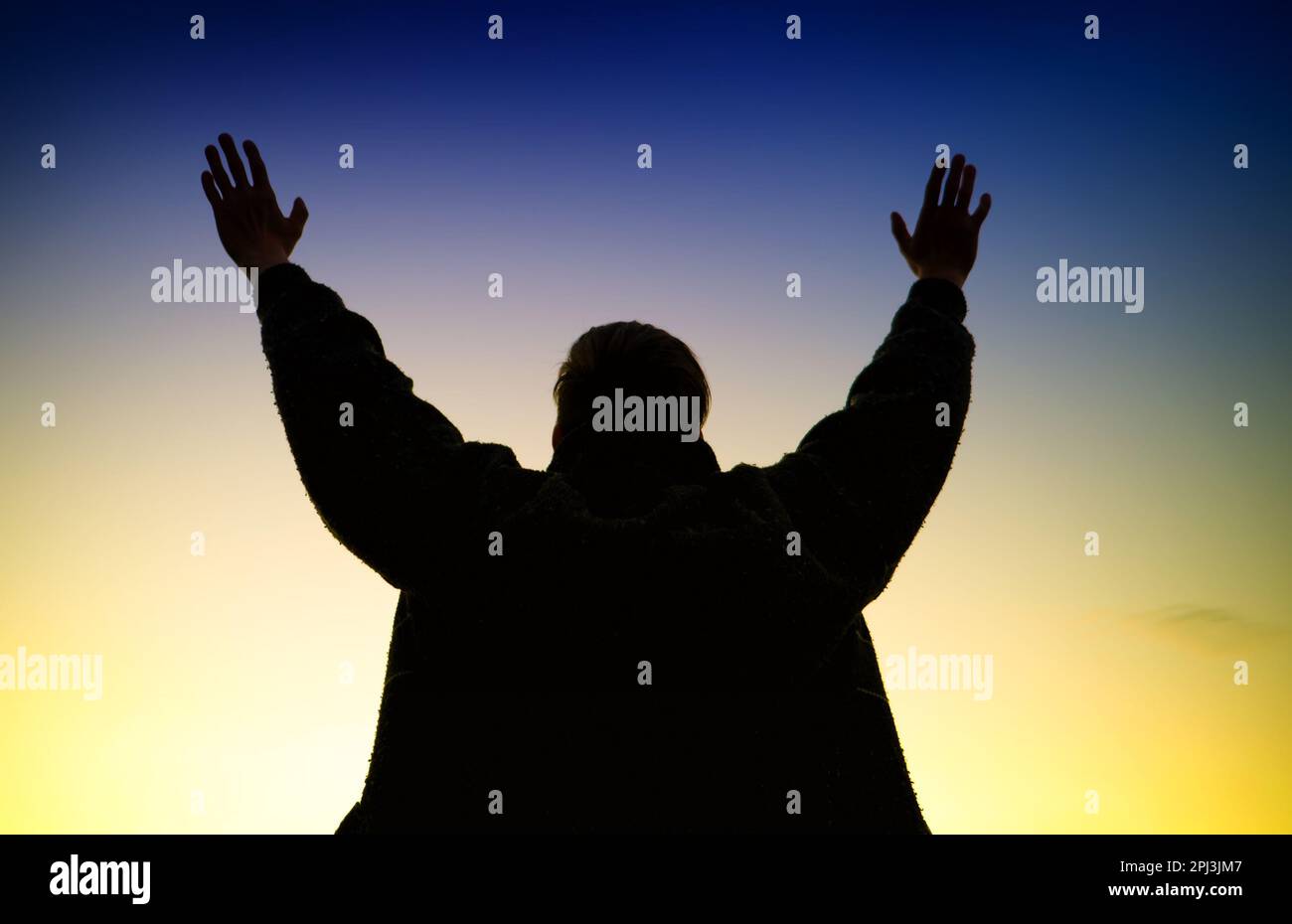 Happy Man with Hands Up on the Sky Background Stock Photo - Alamy