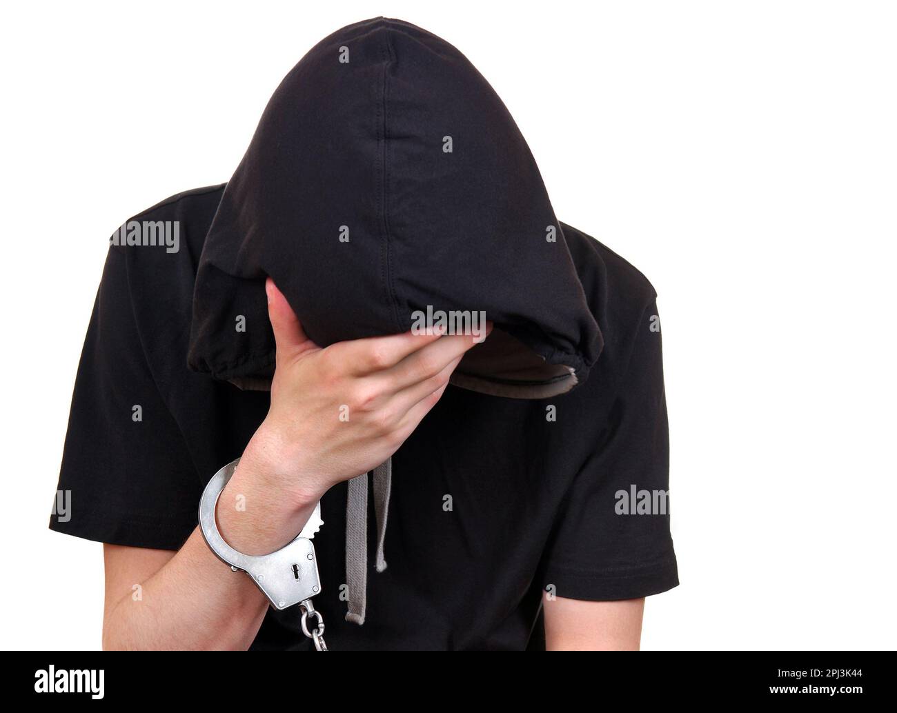 Sad Young Man in Handcuffs Isolated on the White Background Stock Photo