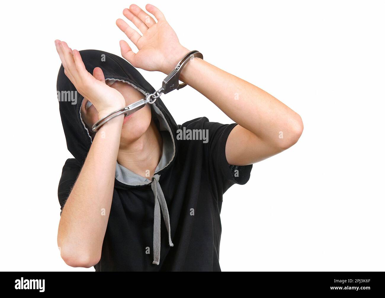 Hostage Man in Handcuffs Isolated on the White Background Stock Photo