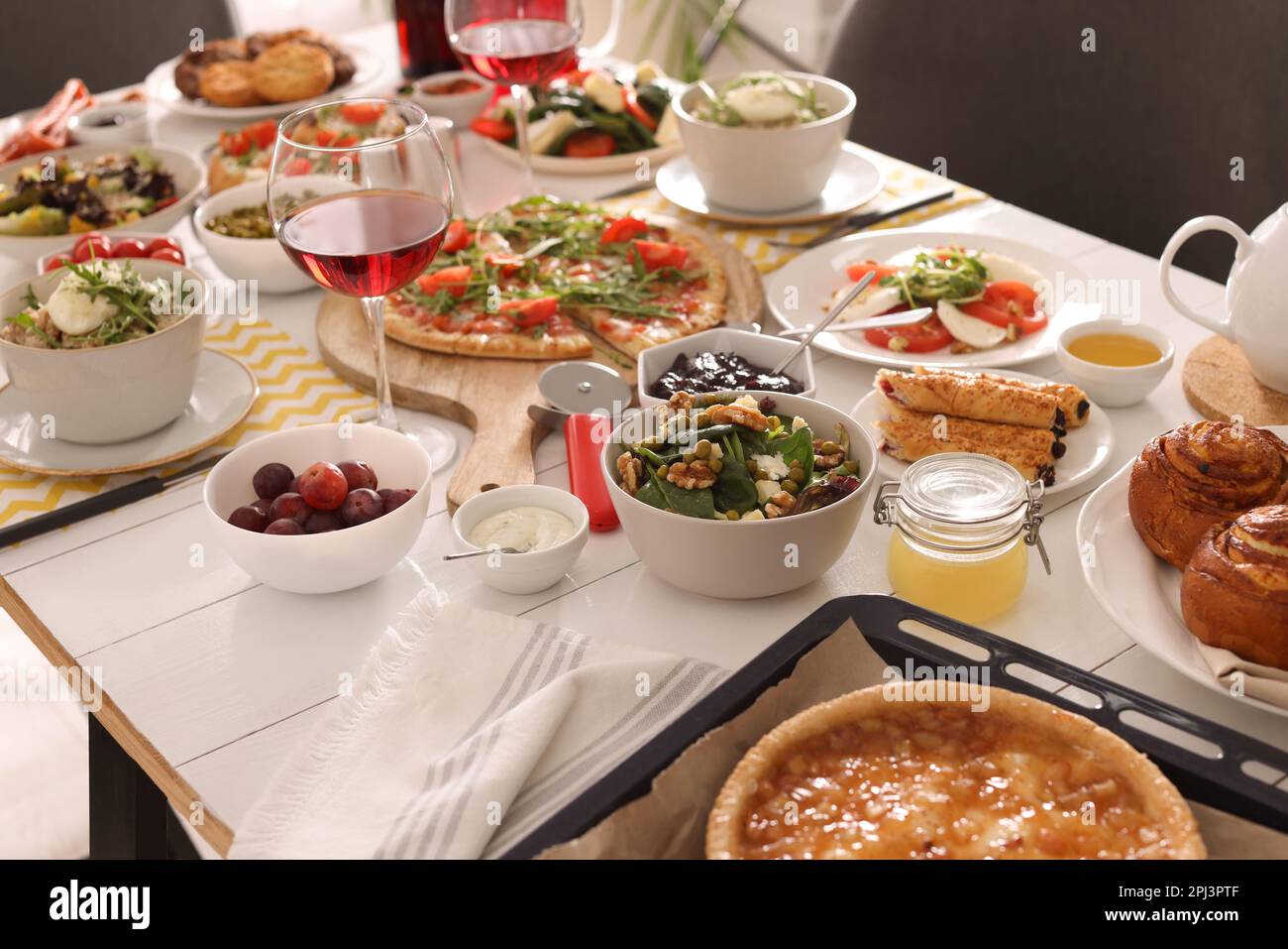 Many different dishes served on buffet table for brunch Stock Photo