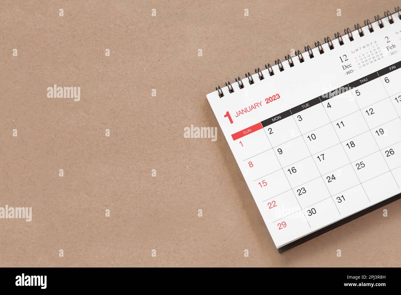 white calendar on brown background Stock Photo Alamy