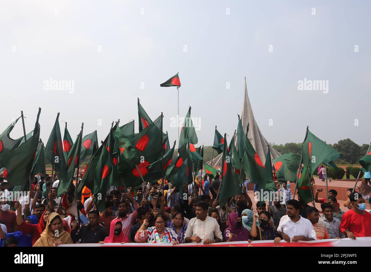 People from all walks of life paid their respects to the freedom fighters at the National Martyrs' Memorial on the 52nd anniversary of Bangladesh’s in Stock Photo