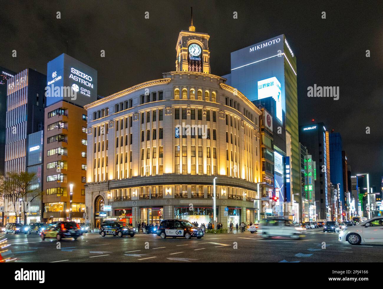 Exterior view at night of Wako department store in Ginza, Tokyo, Japan Stock Photo
