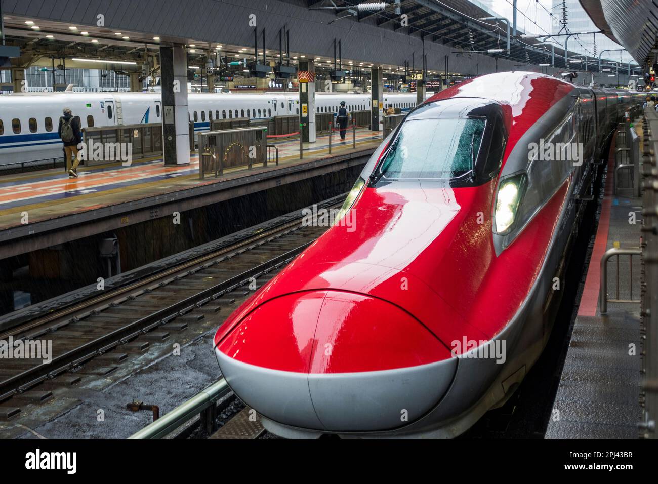 Modern E6 Shinkansen or bullet train at Tokyo Station , Japan Stock Photo