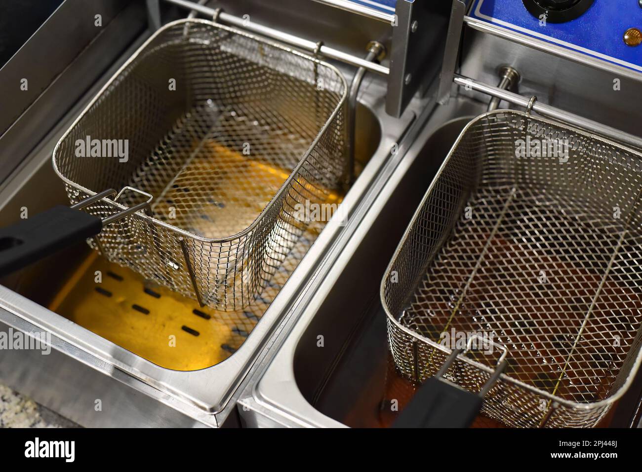 Equipment for deep frying in oil for tacos in a mexican restaurant Stock Photo Alamy
