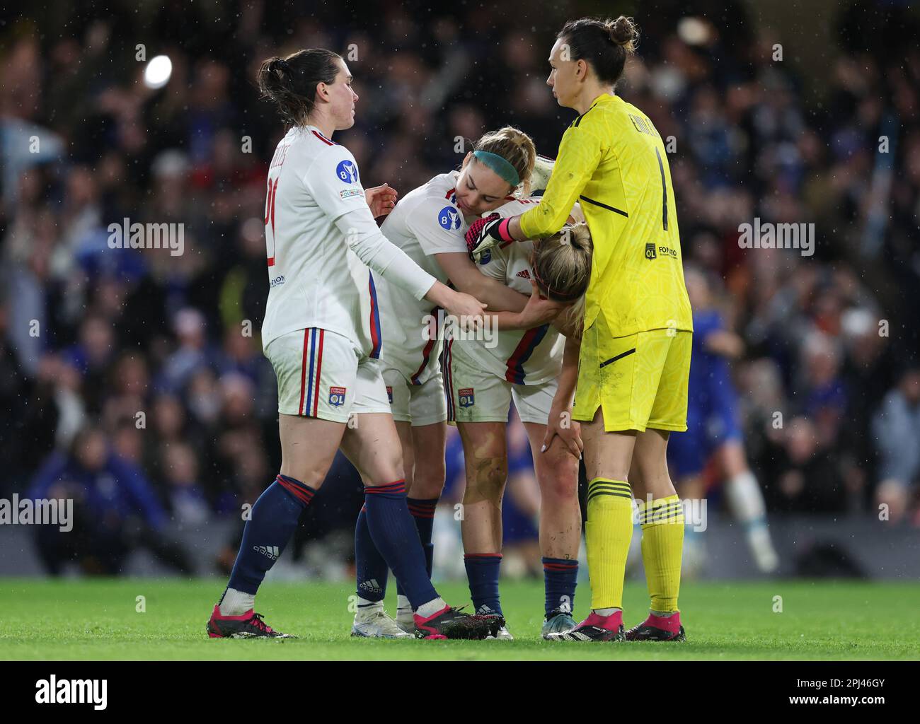 London, UK. 30th Mar, 2023. Lindsey Horan of Olympique Lyon reacts and is consoled by team mates after missing a penalty during the penalty shoot out during the UEFA Womens Champions League match at Stamford Bridge, London. Picture credit should read: Paul Terry/Sportimage Credit: Sportimage/Alamy Live News Stock Photo